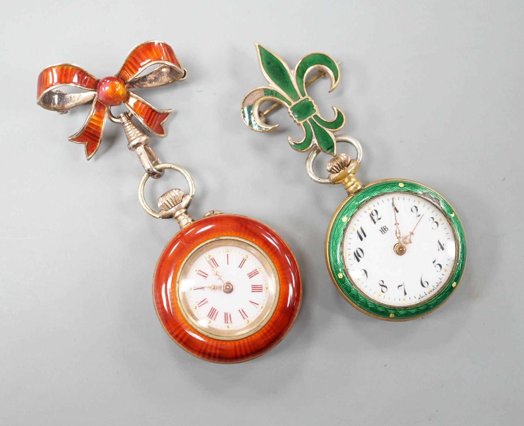 Two lady's early 20th century gilt metal and enamelled fob watches, on enamelled suspension brooches.